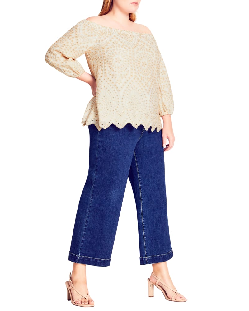 Front of a model wearing a size L TOP SERENE EMB in Ivory/Sand by Refinity. | dia_product_style_image_id:288097